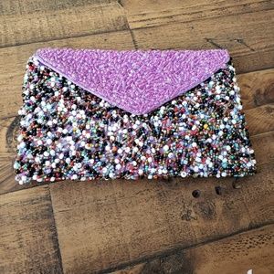 Purple beaded clutch